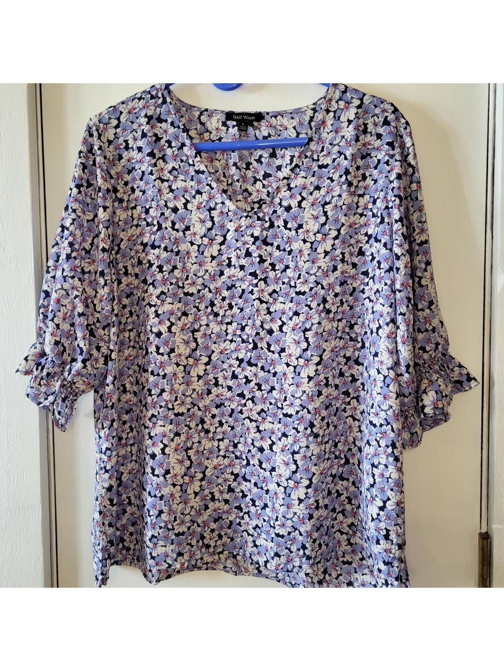 Well Worn floral print blouse featuring a V-neckline and ruffled elbow-length LG